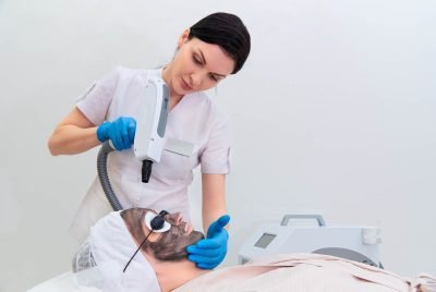 Procedure carbon facial peeling in the clinic of laser cosmetology.